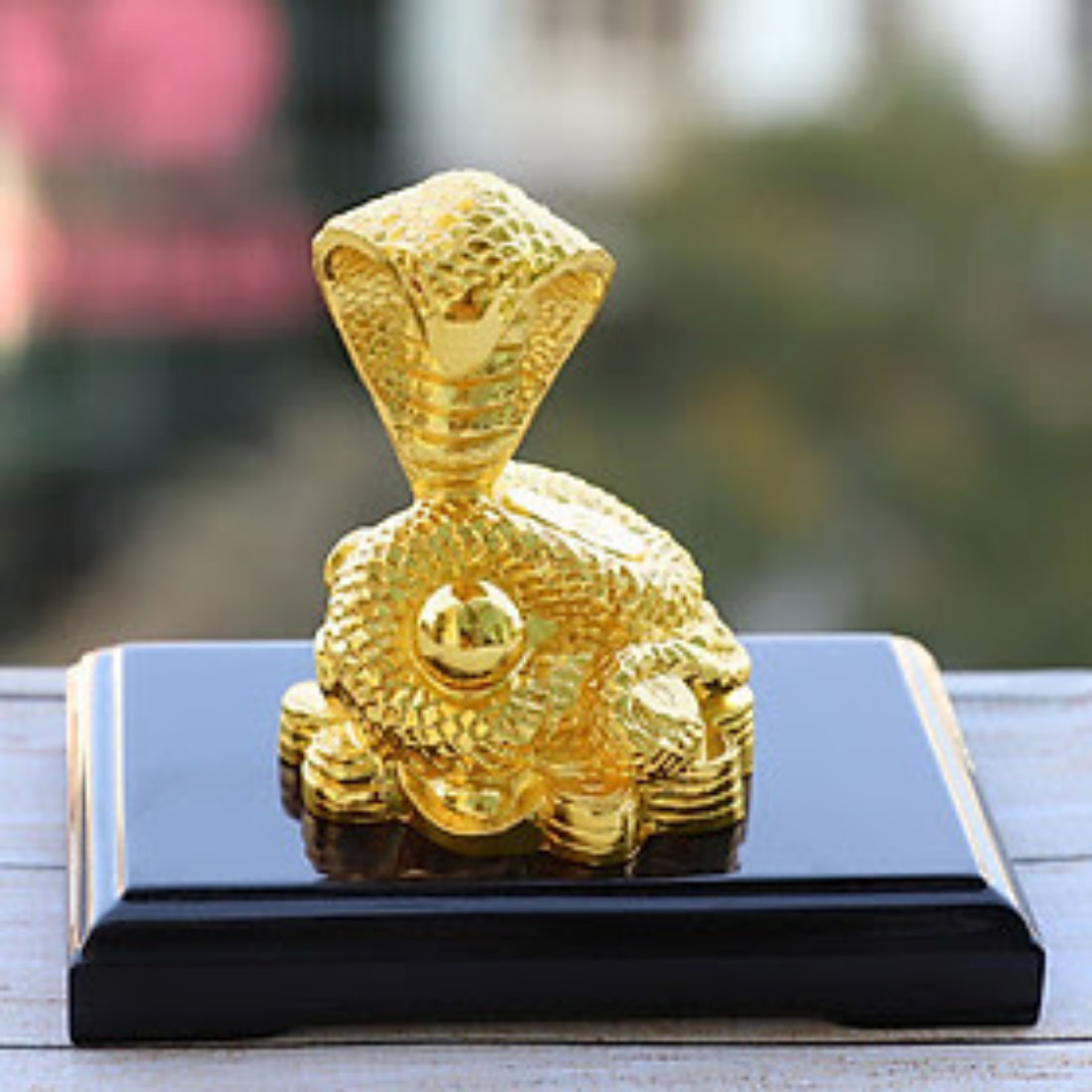 Gold-plated feng shui snake mascot