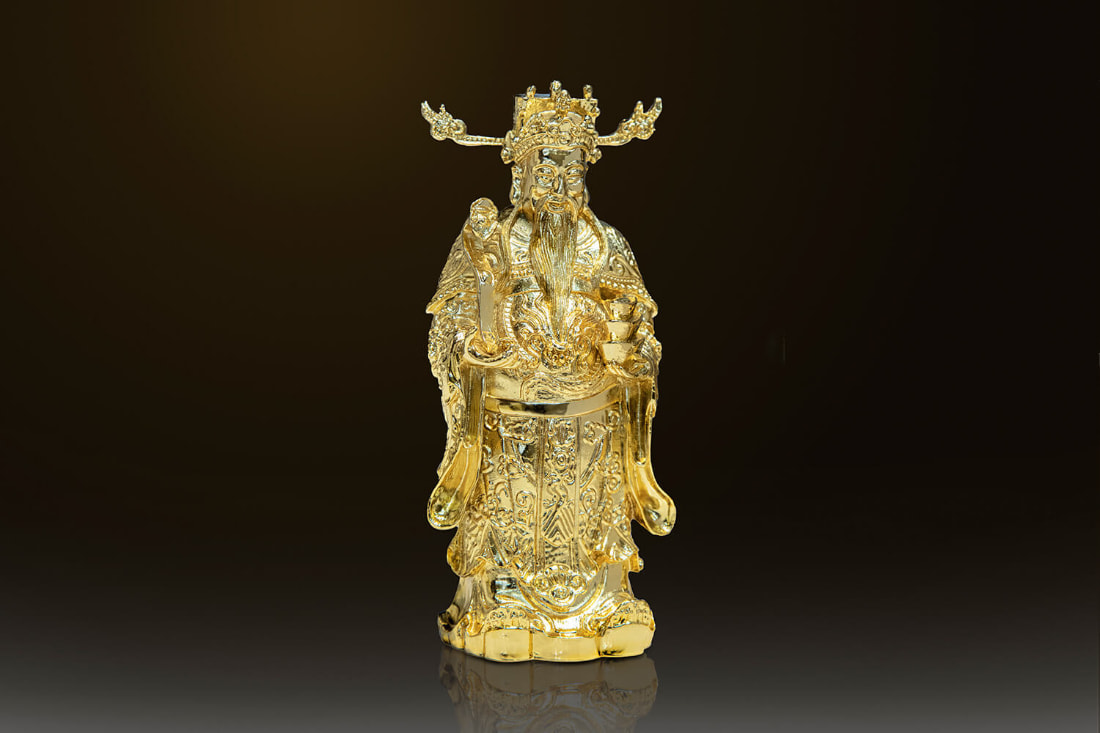 Gold-plated God of Wealth statue