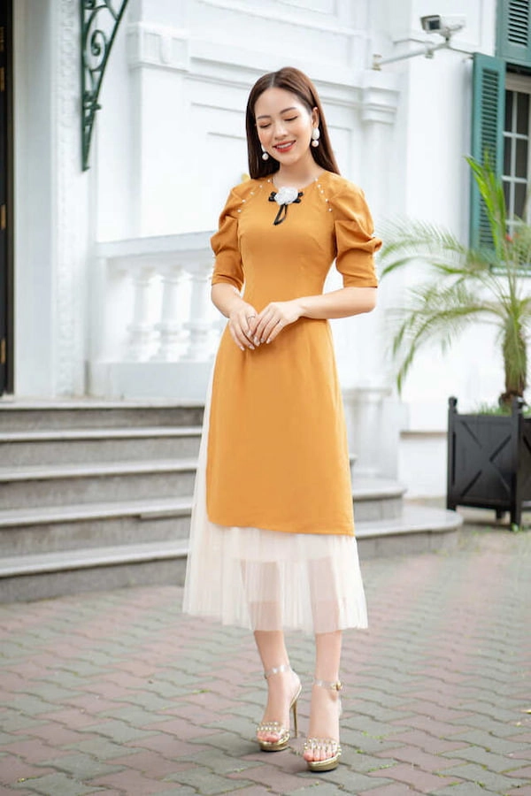 mau-ao-dai-co-vuong-tay-phong-13